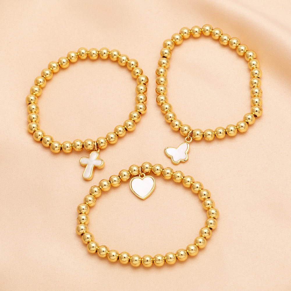 Elastic bead bracelet with heart charm 6mm bead