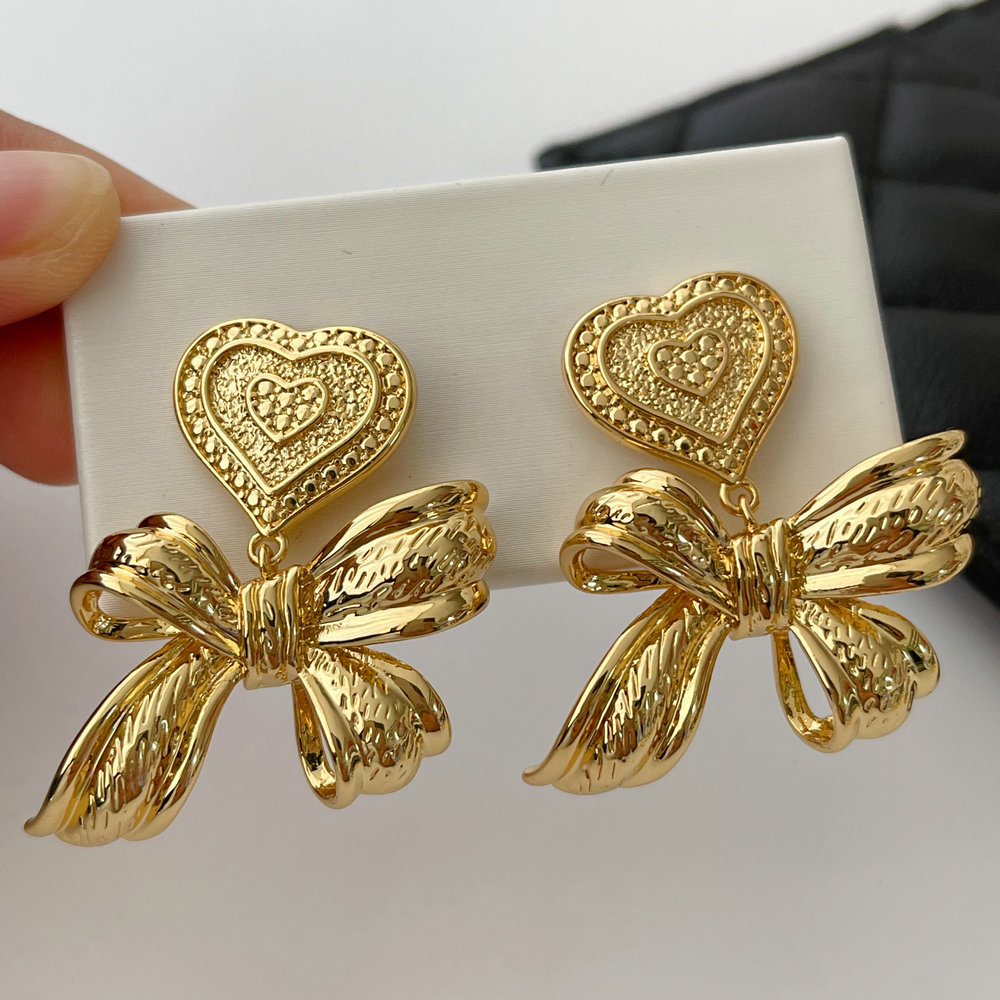 Bow charm earrings