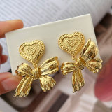 Bow charm earrings