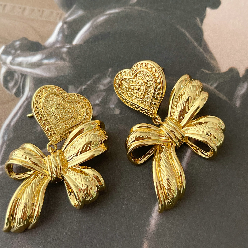 Bow charm earrings
