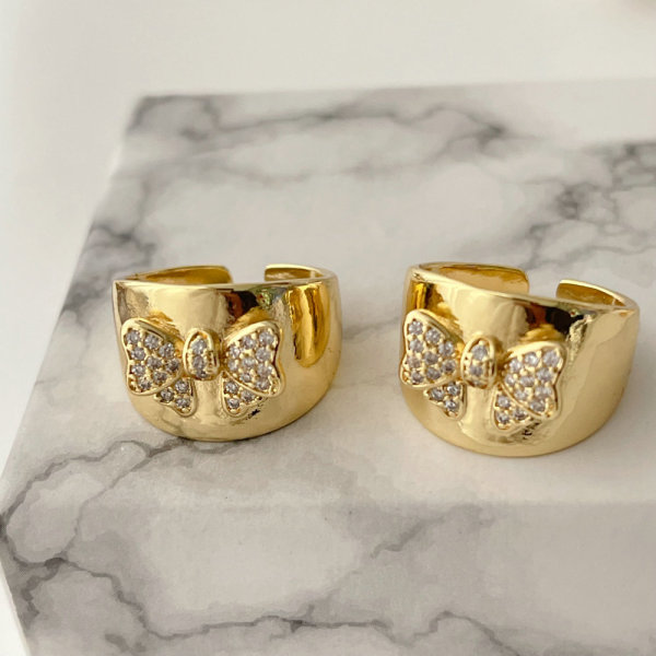 Pave bow adjustable ring