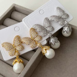 Pave butterfly pearl earrings