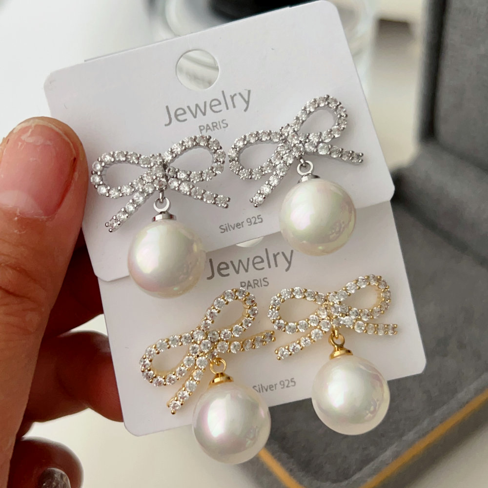 Pave bow pearl earrings