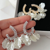 Pave glass shell charm earrings