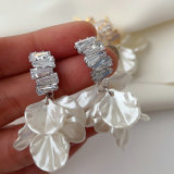 Glass shell charm earrings