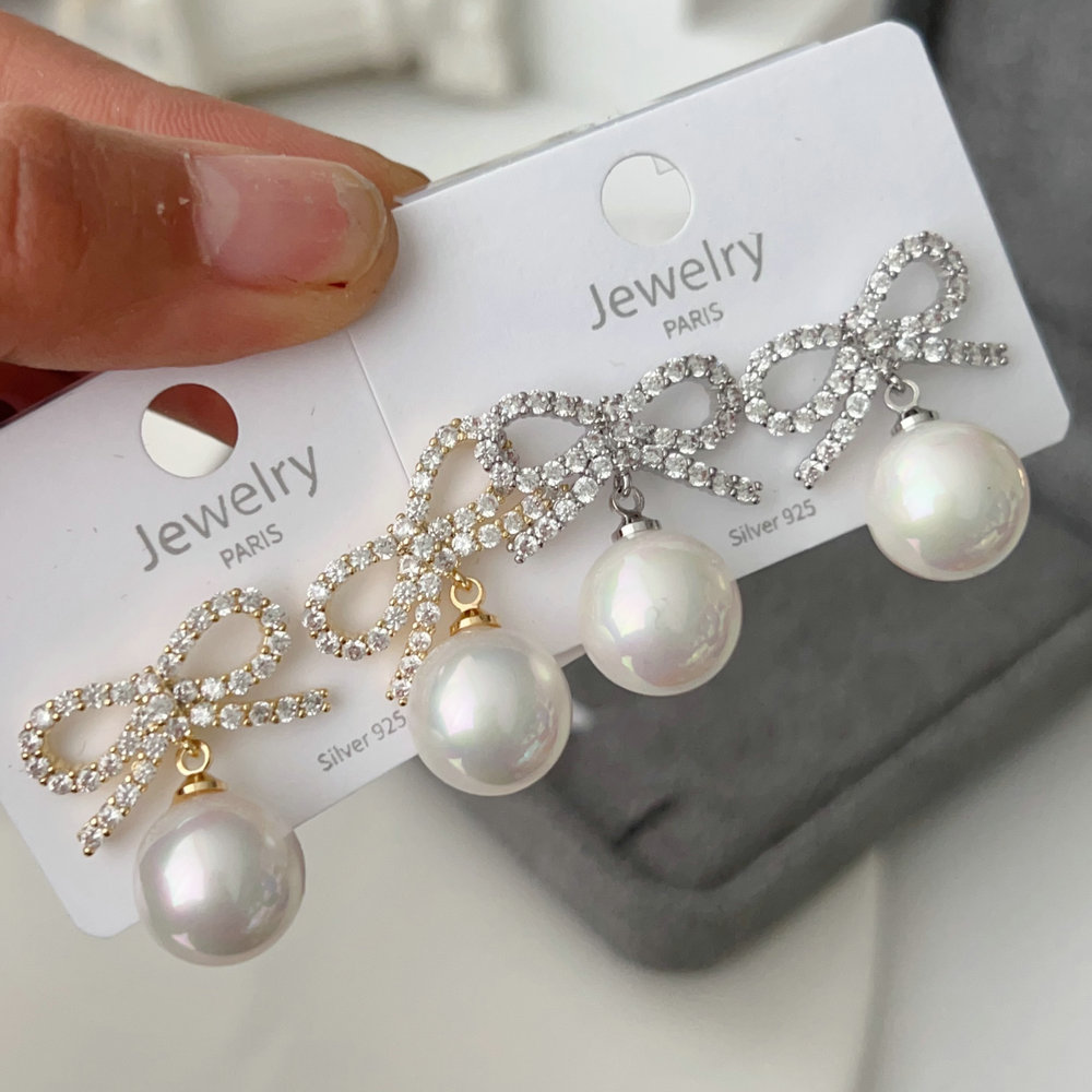 Pave bow pearl earrings