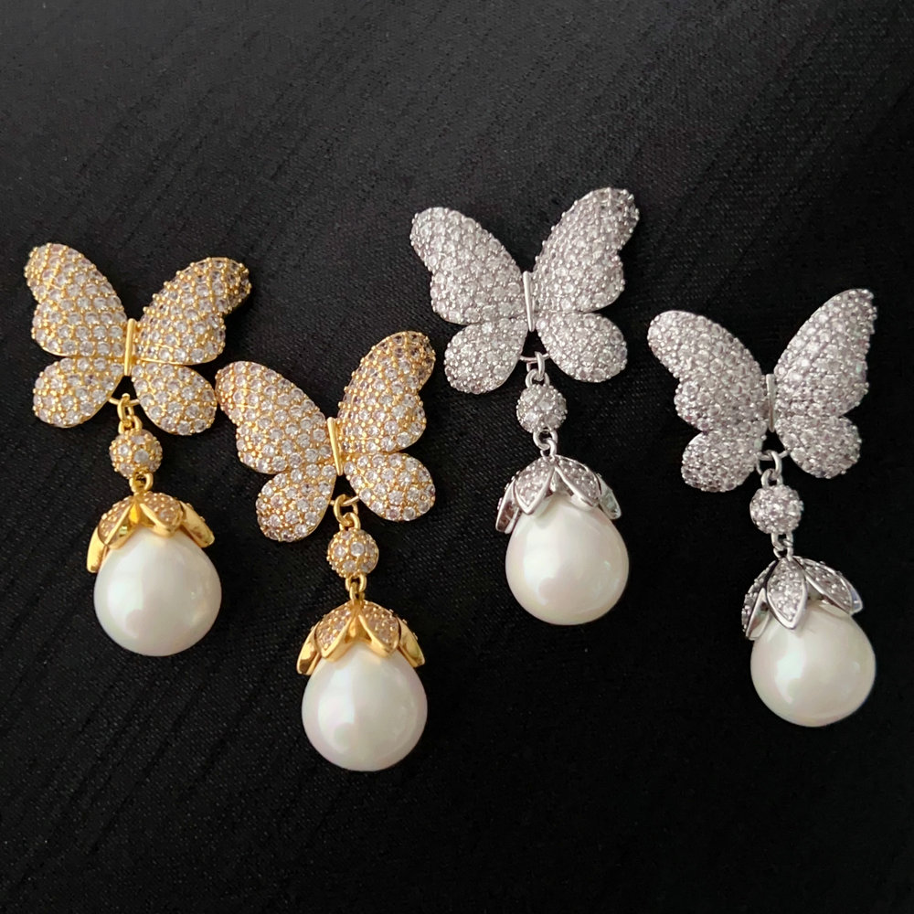 Pave butterfly pearl earrings