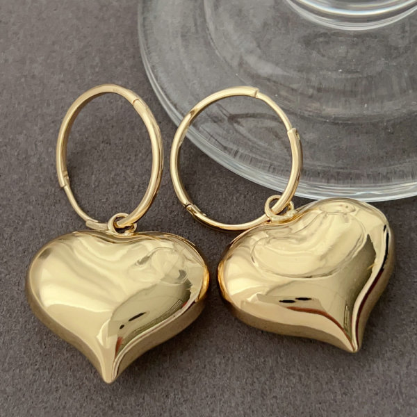 Metal heart pendant earrings