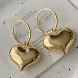 Metal heart pendant earrings