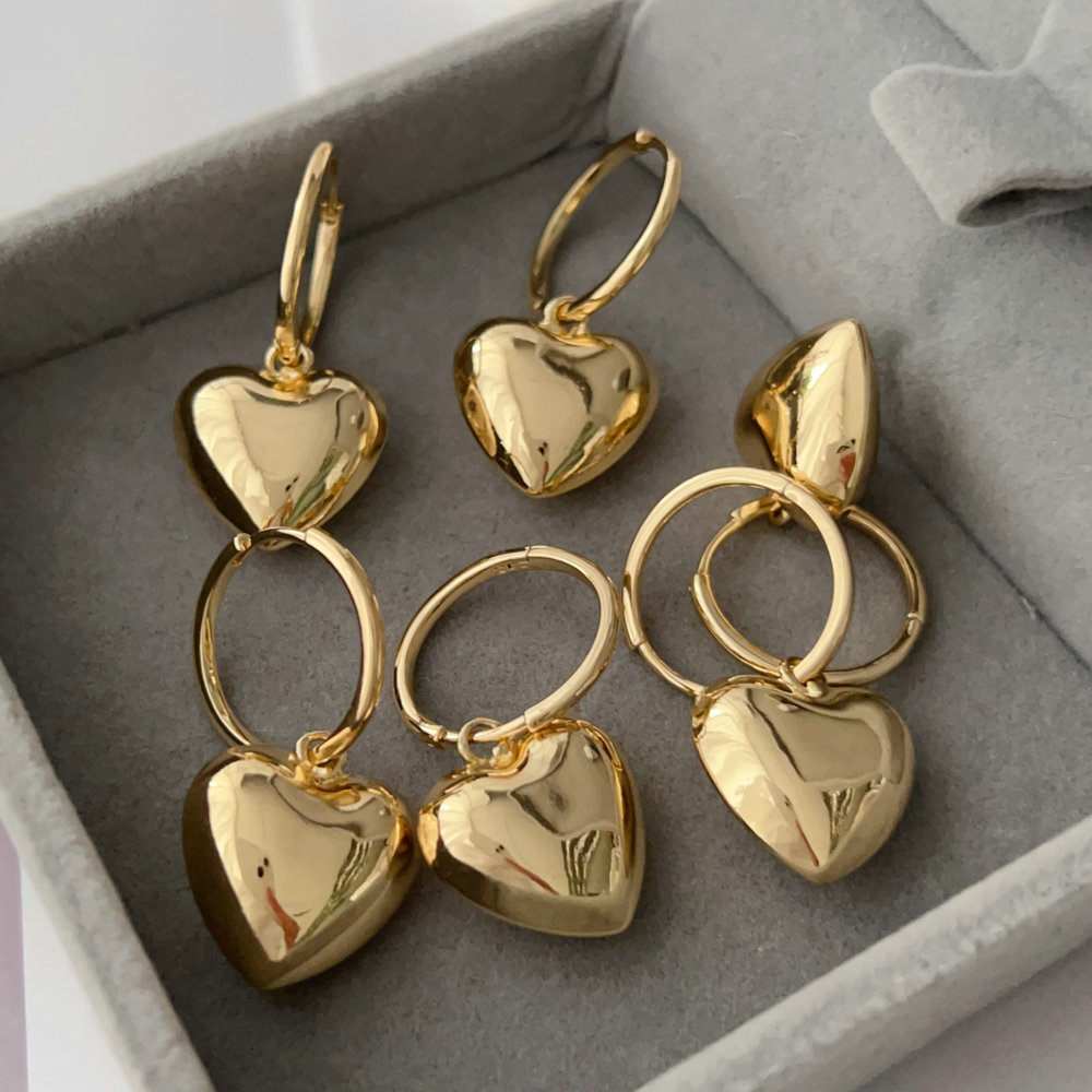 Metal heart charm earrings