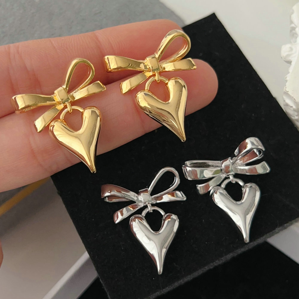 Bow heart charm earrings