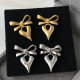 Bow heart charm earrings