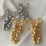 Bow bead tassel earrings