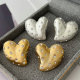 Brushed metal heart earrings
