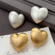 Brushed metal heart earrings