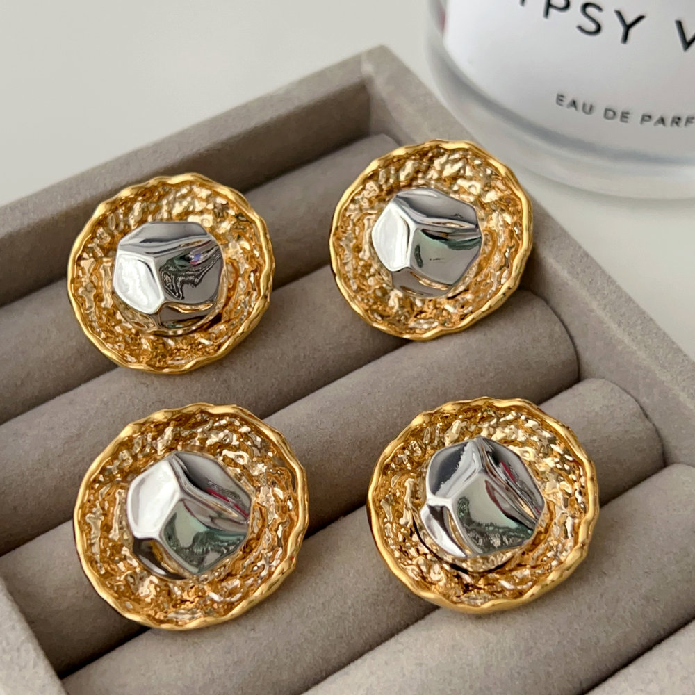 Gold and silver round earrings