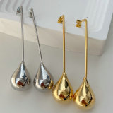 Long ball metal earrings