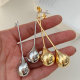Long ball metal earrings