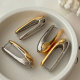 Silver and gold metal oval earrings
