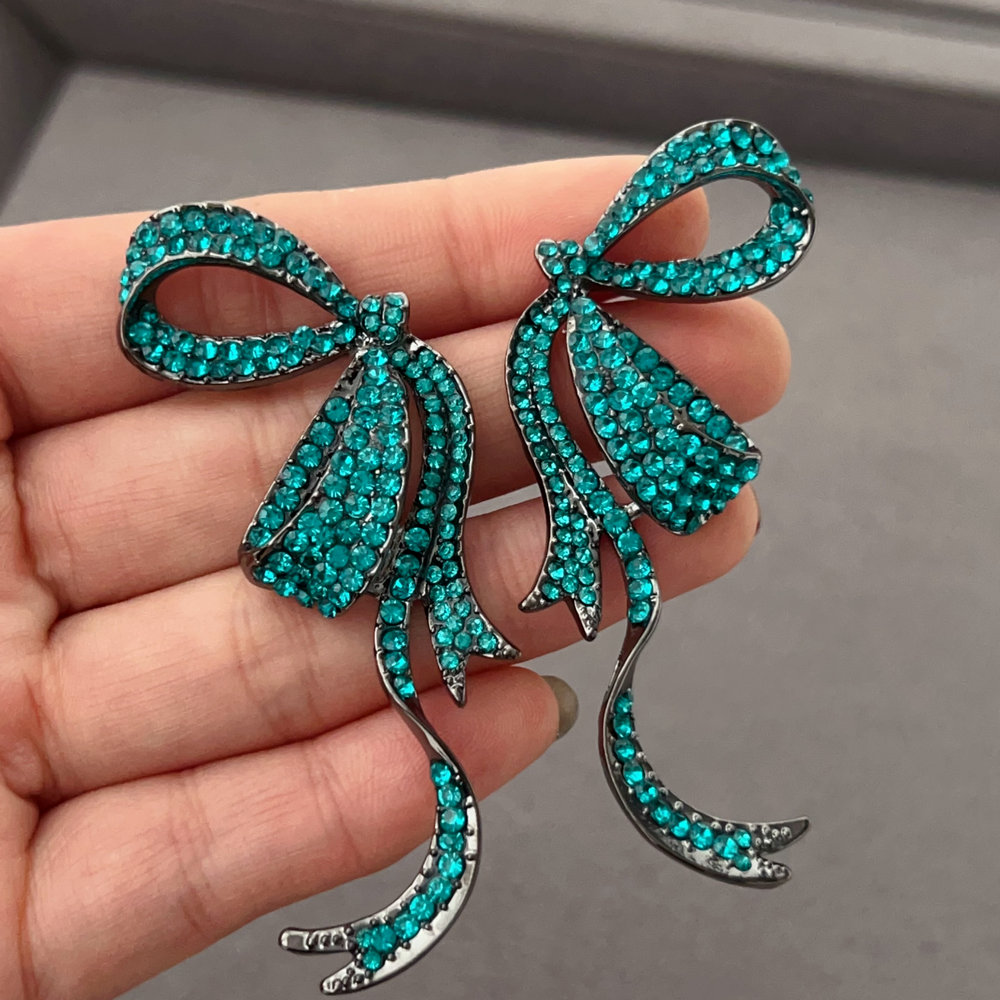 Blue crystal bow earrings