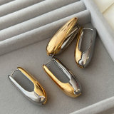 Silver and gold metal oval earrings