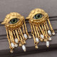 Eye tassel earrings