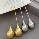 Long ball metal earrings