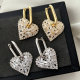 Pave heart charm earrings