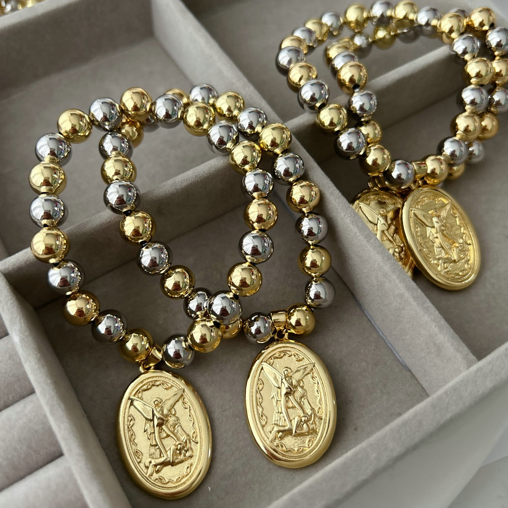 ball bracelet with charm