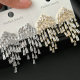 Pave zircon chain tassel earrings