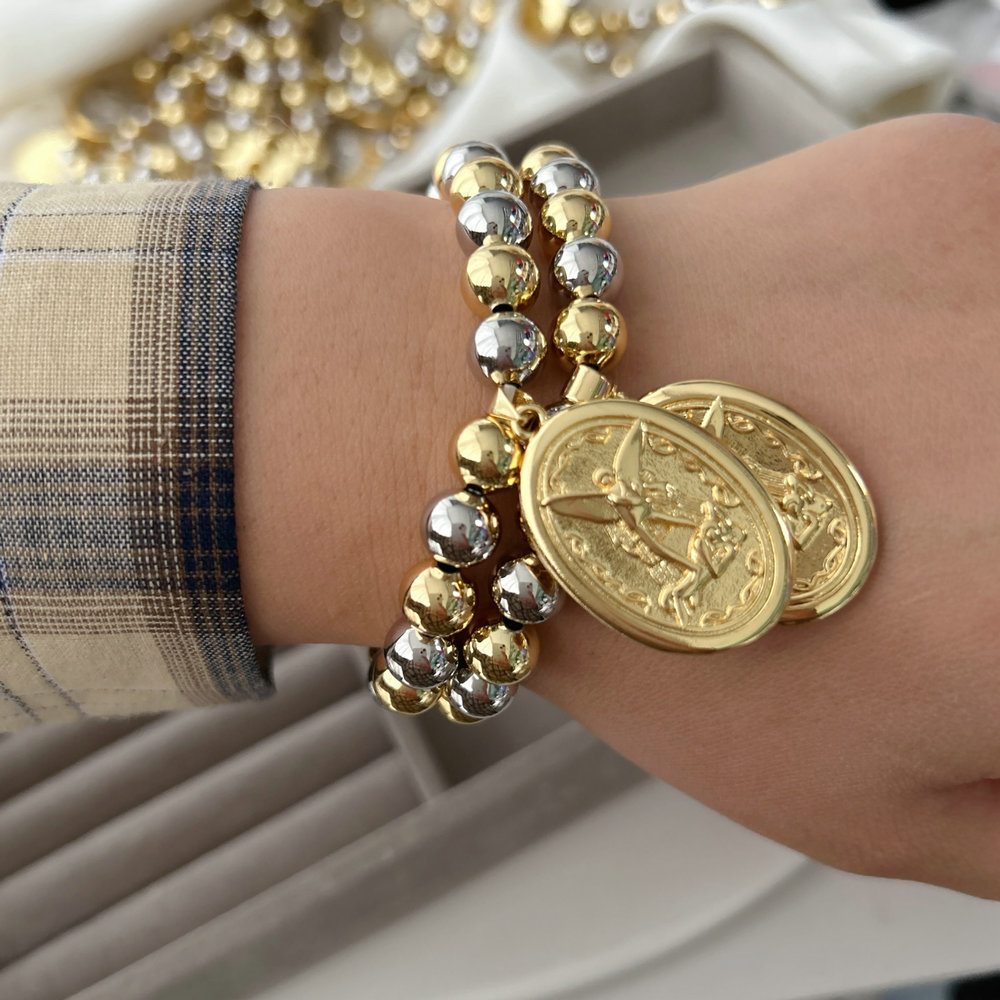 ball bracelet with charm