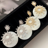 Shell sunflower earrings