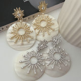 Shell sunflower earrings