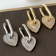 Shell heart charm earrings
