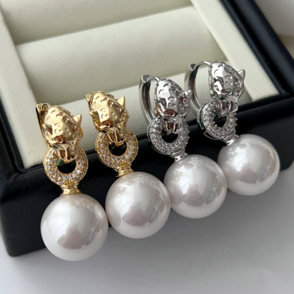 Pave lion pearl earrings