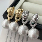 Pave lion pearl earrings