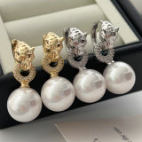 Pave lion pearl earrings