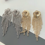 Pave flower tassel earrings