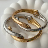Metal twist bangle