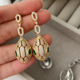 Pave lion earrings