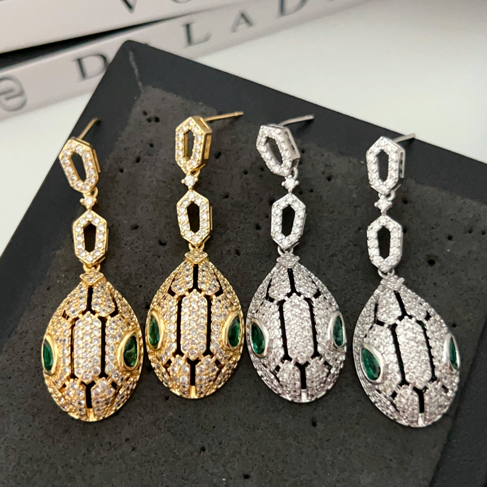 Pave lion earrings