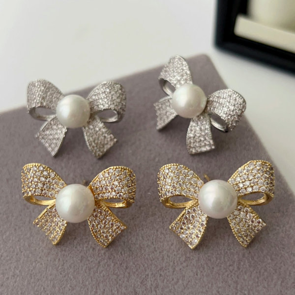 Zircon bow pearl earrings