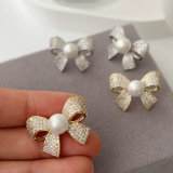 Zircon bow pearl earrings