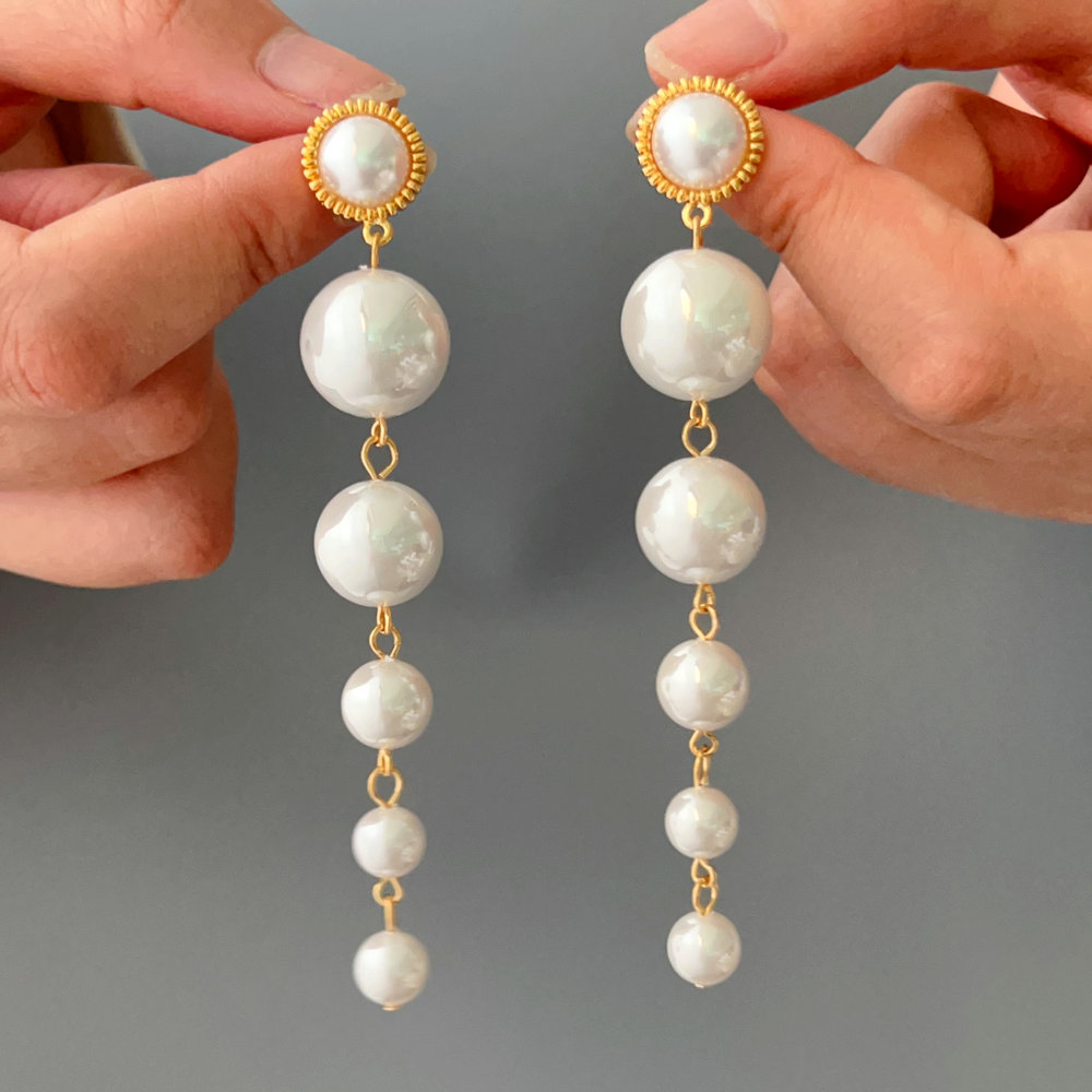 Long pearl earrings
