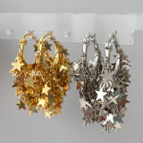Max star charm earrings