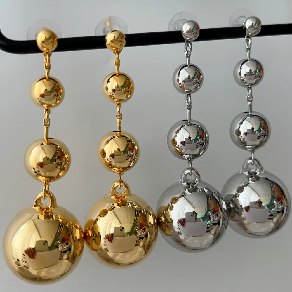 Chunky long ball earrings