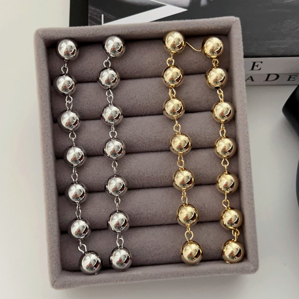 Long ball earrings
