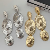 Chunky long metal earrings