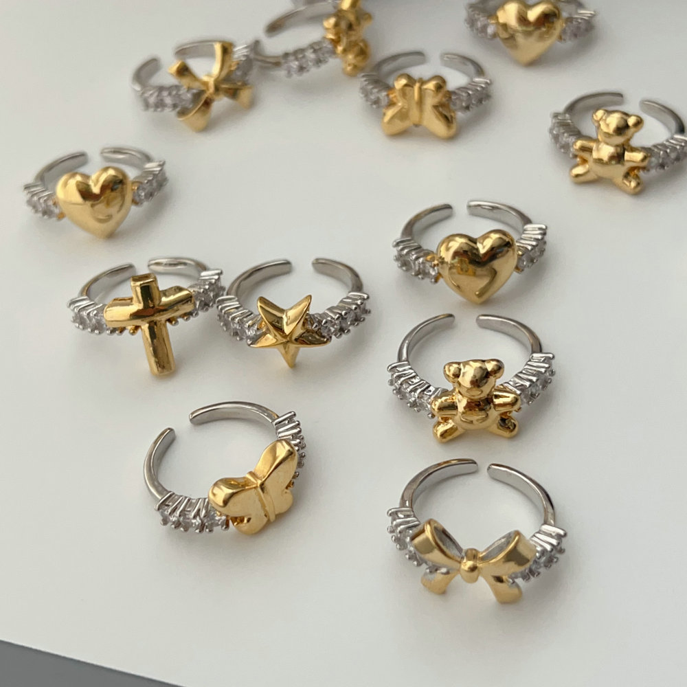 Pave cross heart star ring