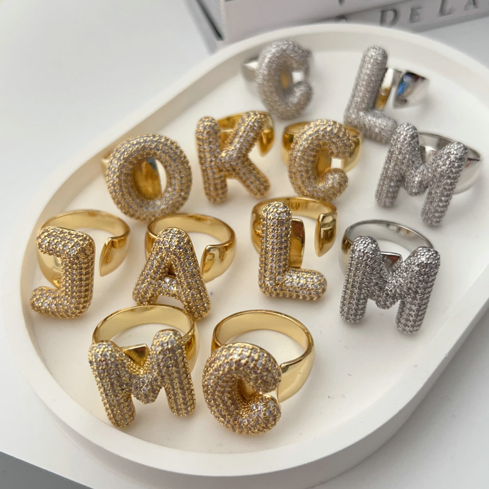 Pave letter zircon ring